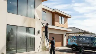 Professional pressure cleaning restoring Fresno, CA home siding and driveway surfaces