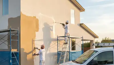Professional stucco repair on Fresno CA home exterior by expert house painters restoring curb appeal